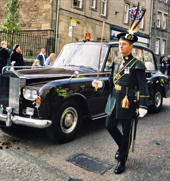 Sir Lachlan Maclean, serving as the historic silver Stick for Scotland in 2004 during the Queen’s visit